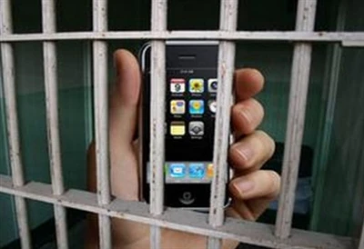 Mobiliojo telefono signalo blokavimo taikymas kalėjime